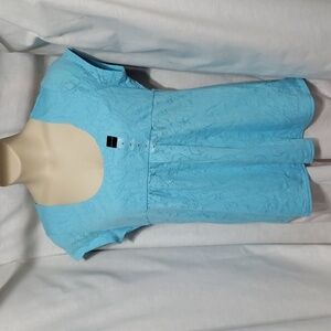 Calvin Klein Jeans. NWT. Robin Egg Blue Top; Scoop Neck; Short Sleeves. Size XL